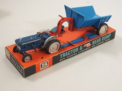 Lot 526 - A pair of diecast vehicles sets comprising a...