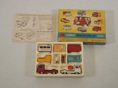 Lot 526 - A pair of diecast vehicles sets comprising a...