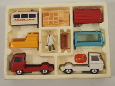 Lot 526 - A pair of diecast vehicles sets comprising a...