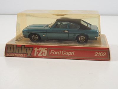 Lot 570 - A group of three DINKY 1:25 scale diecast Ford...