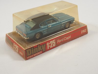Lot 570 - A group of three DINKY 1:25 scale diecast Ford...