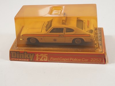 Lot 570 - A group of three DINKY 1:25 scale diecast Ford...