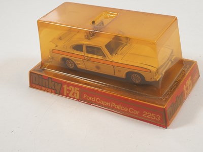 Lot 570 - A group of three DINKY 1:25 scale diecast Ford...