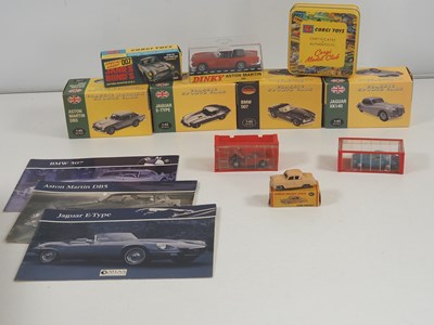Lot 604 - A group of four diecast cars by DINKY to...