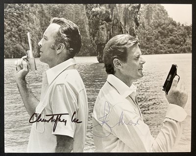 Lot 526 - JAMES BOND AUTOGRAPH - A 8" x 10" black and...