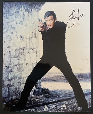 Lot 513 - JAMES BOND AUTOGRAPHS - An 8" d 10" colour...