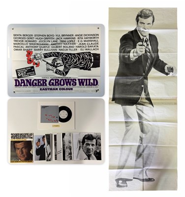 Lot 461 - A selection of James Bond related memorabilia...