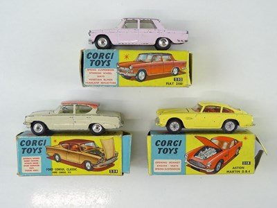 Lot 104 - A group of CORGI Toys cars comprising: a 218...