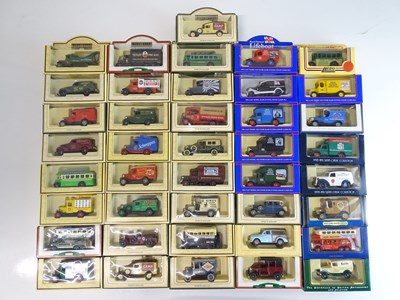 Lot 27 - A large tray of diecast vans, buses etc mostly...