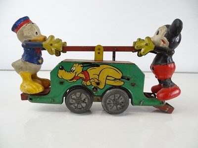 Lot 60 - A WELLS tinplate 1920s/30s Walt Disney Mickey...