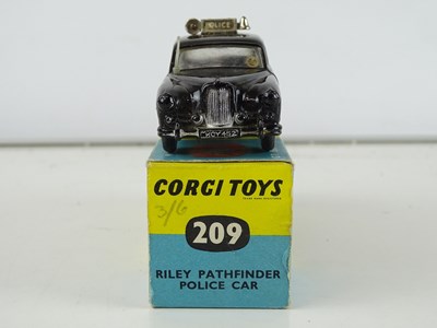 Lot 77 - A CORGI Toys 209 Riley Pathfinder Police car -