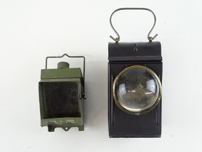 Lot 123 - A pair of Railway hand lamps - one marked LMS,...