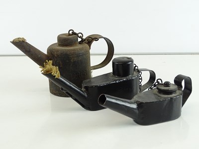 Lot 45 - A group of three steam locomotive oil cans...