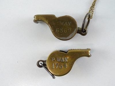 Lot 65 - A group of brass Thunderer Patent whistles all...