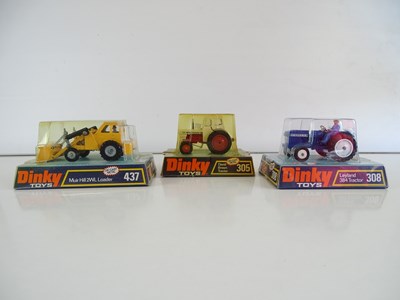 Lot 16 - A group of DINKY tractors comprising 305, 308...