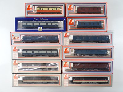 Lot 338 - A large group of LIMA OO Gauge parcels vans in...