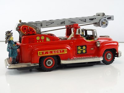 Lot 95 - A 1950s Japanese tinplate NOMURA battery...